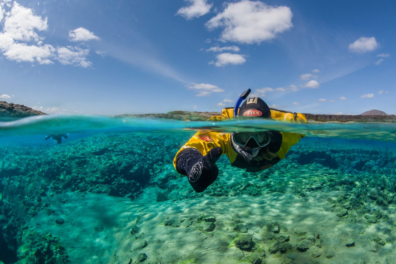 Close-up of man snorkeling on sunny day 