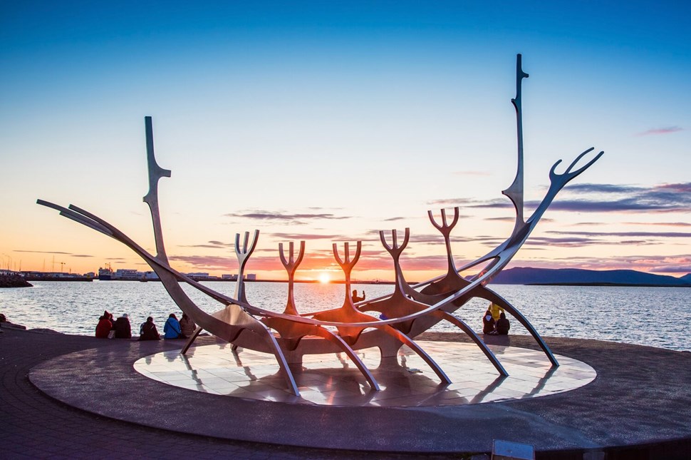 Sun Voyager sculpture with sunset on background