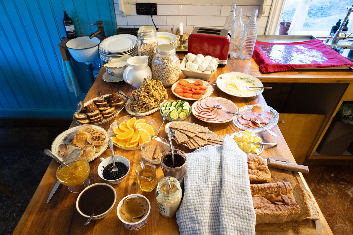 Full breakfast table at farm hotel in Iceland