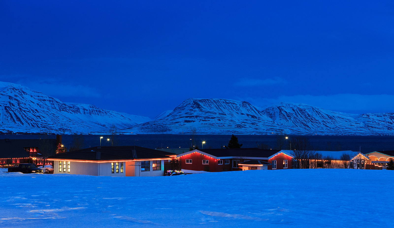 Typical Icelandic houses with Christmas decorations near Akureyri, Iceland.