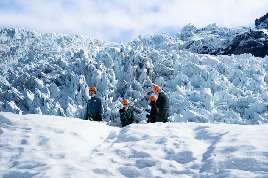 People enjoying on Icelandic glacier