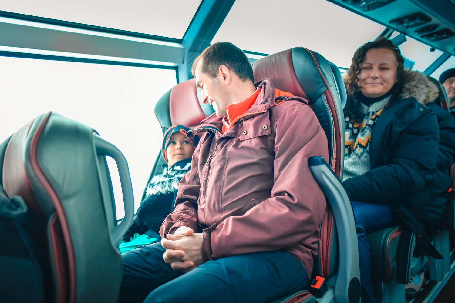 Family driving in a bus