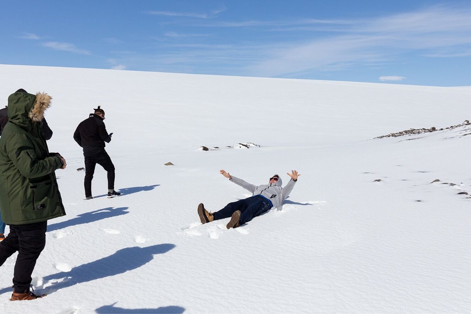 People enjoying on glacier