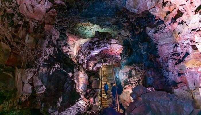 Stair in huge lava cave underground