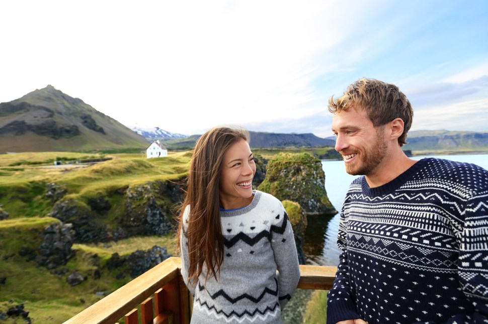 Woman and man smiling in Iceland