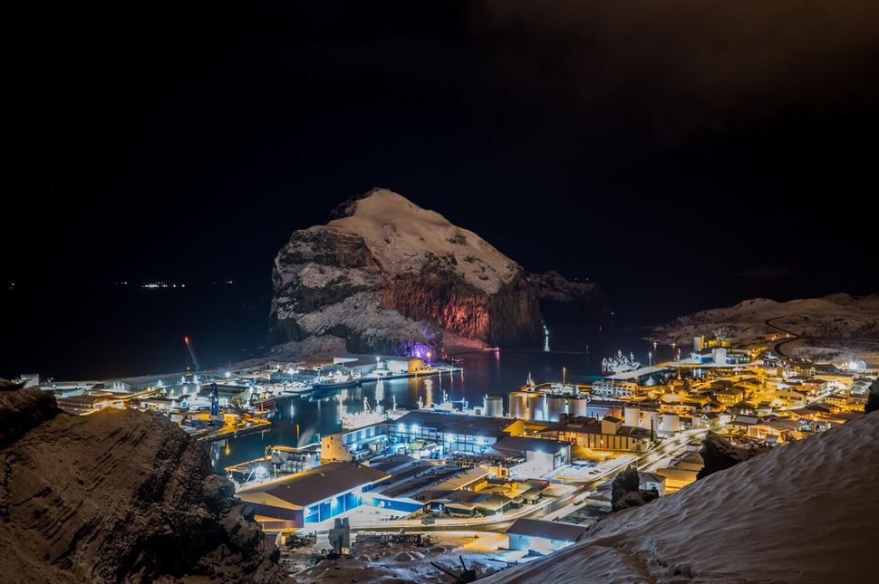 Vestmannaejar town at night Heimay Westmann island port at night, with lights