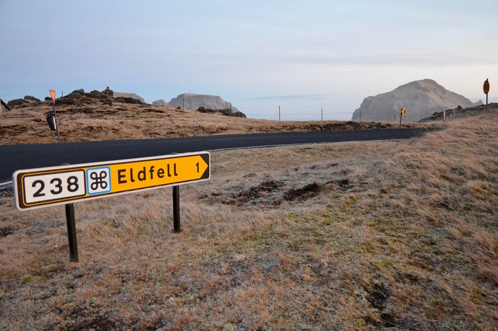 Eldfell sign post Eldfell directions sign post by road, in Heimaey, Westman islands