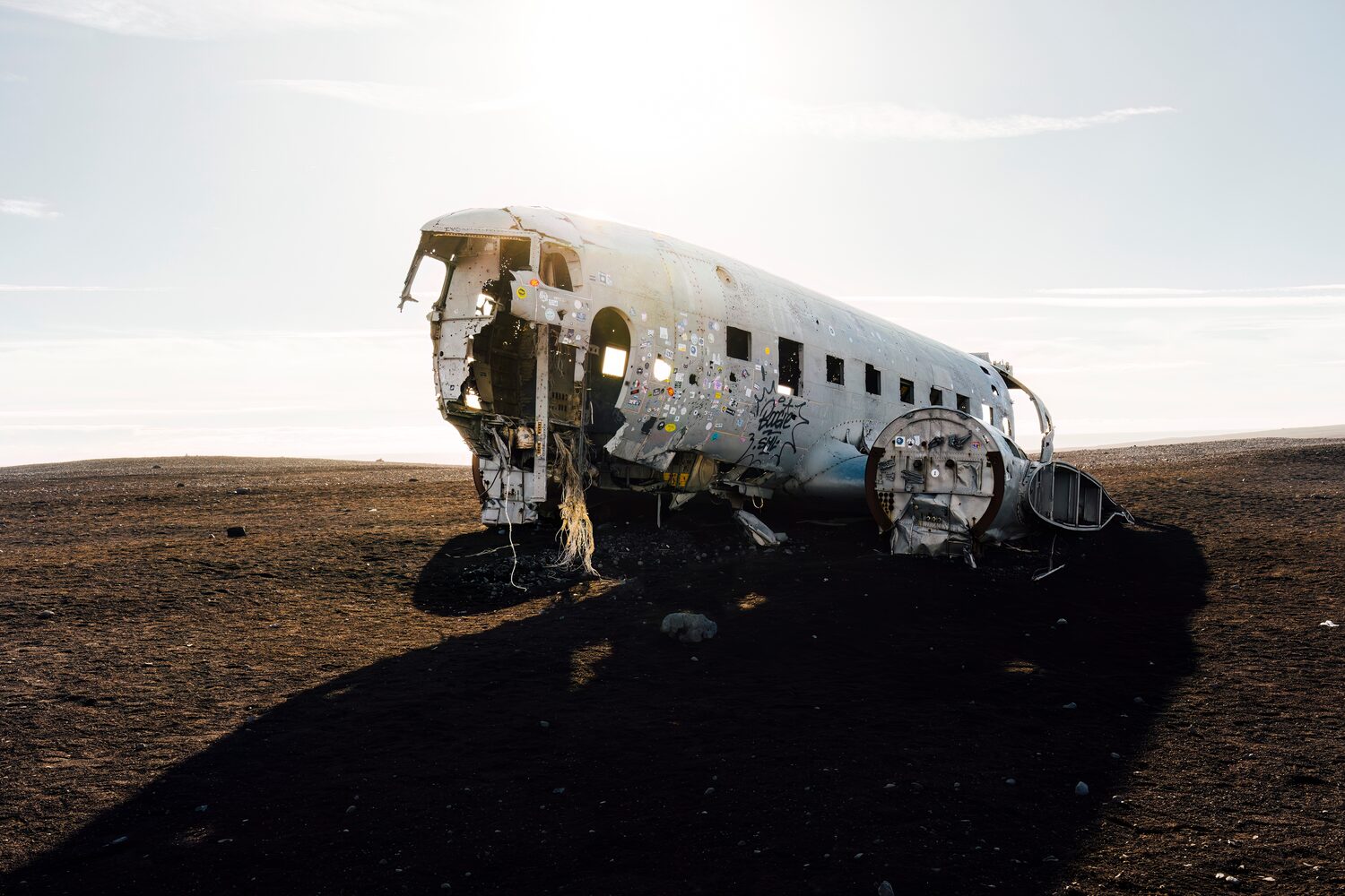Wreckage of a plane on a Sólheimasandur Black Sand Beach