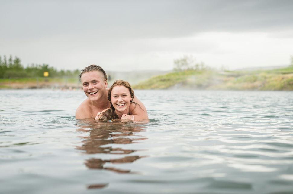 Couple of people bathing in Lagoon hot spring waters