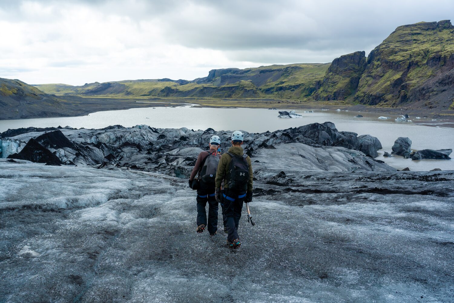 People walking to glacier lagoon in Iceland