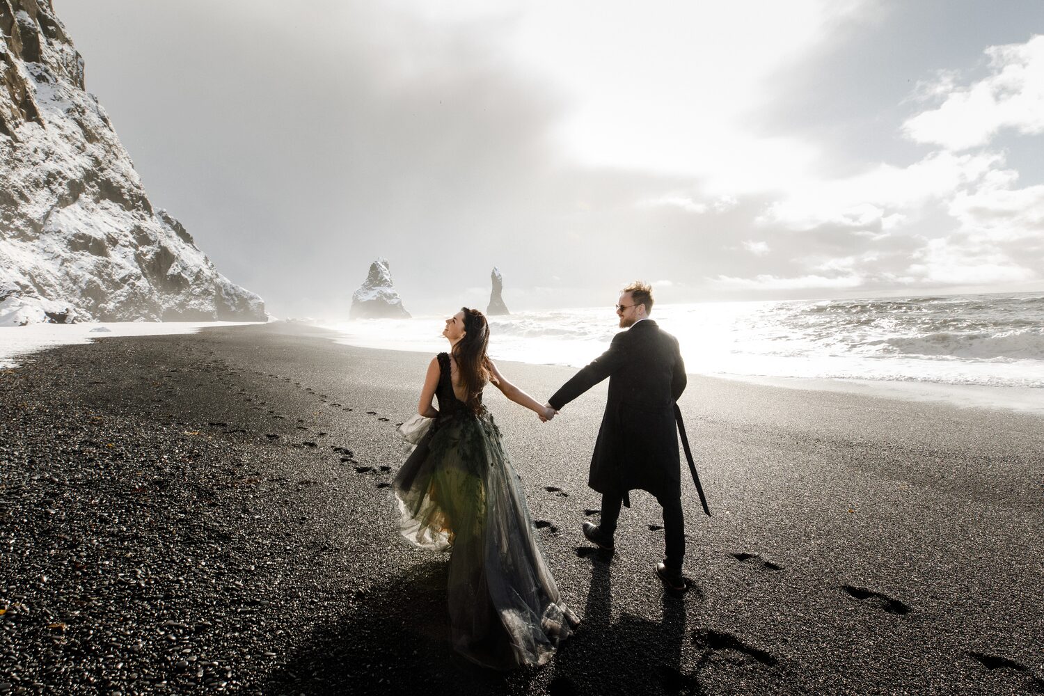 Couple in Reynisfjara beach