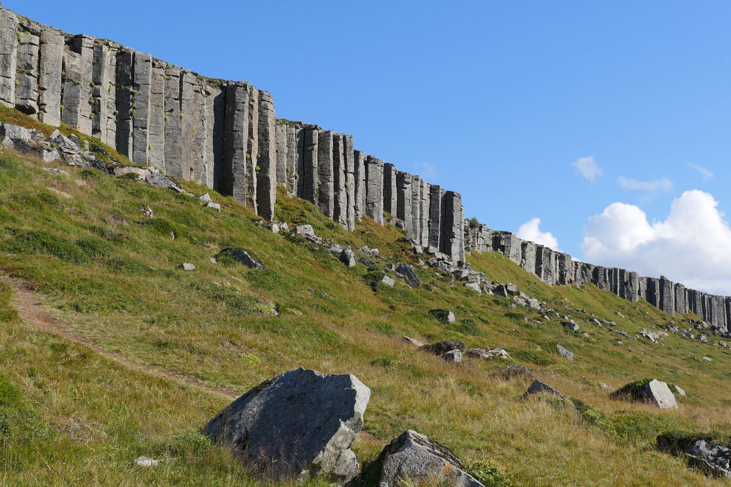 Neatly formed tall basalt sticks of rock
