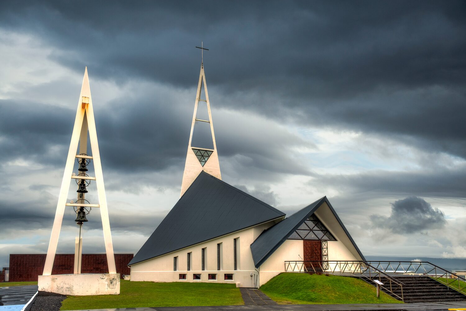 Interesting triangular designed church with triangular bell tower