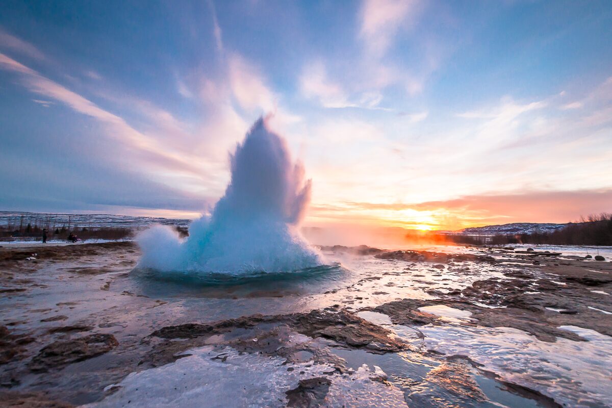 Strokkur geyser erupting in the hot springs of the Golden Circle Iceland route