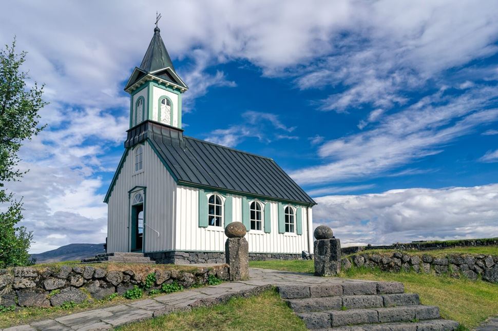 Thingvellir Church Summer Thingvellir white traditional church in summer with light blue trim