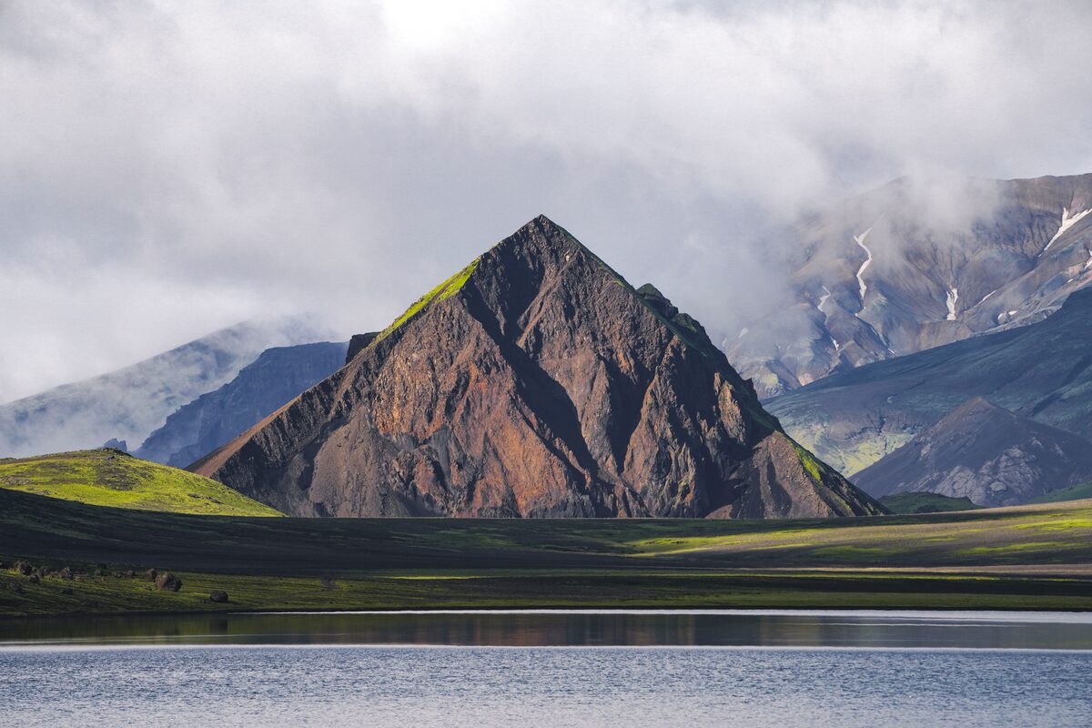 Lake Alftavatn mountain shaped like three triangles at edge of lake