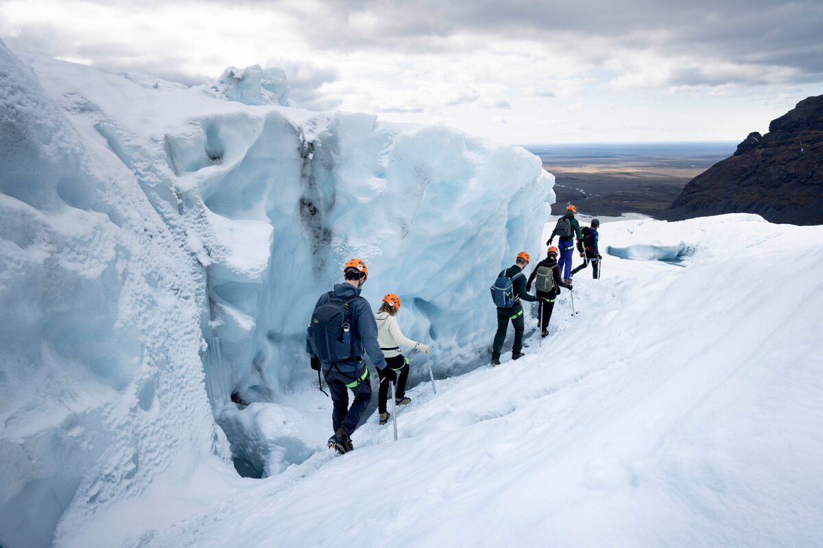 Group hiking on glacier in Iceland