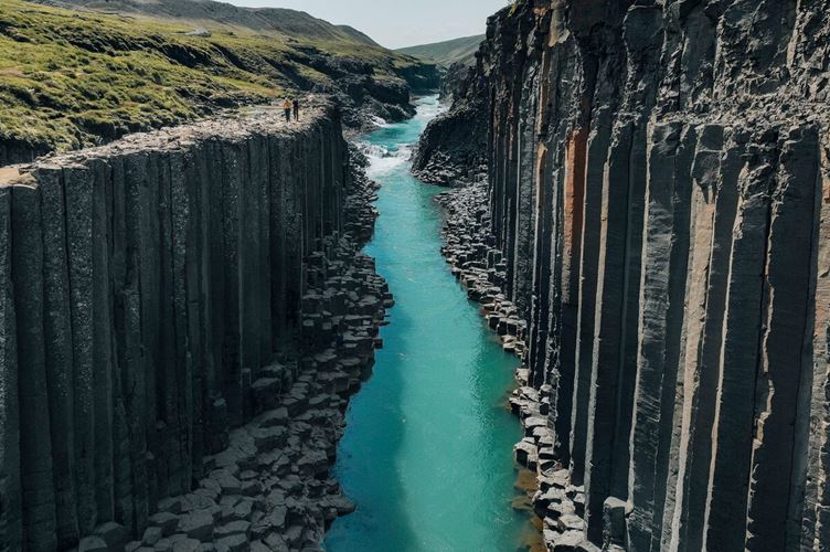 High canyon with blue river