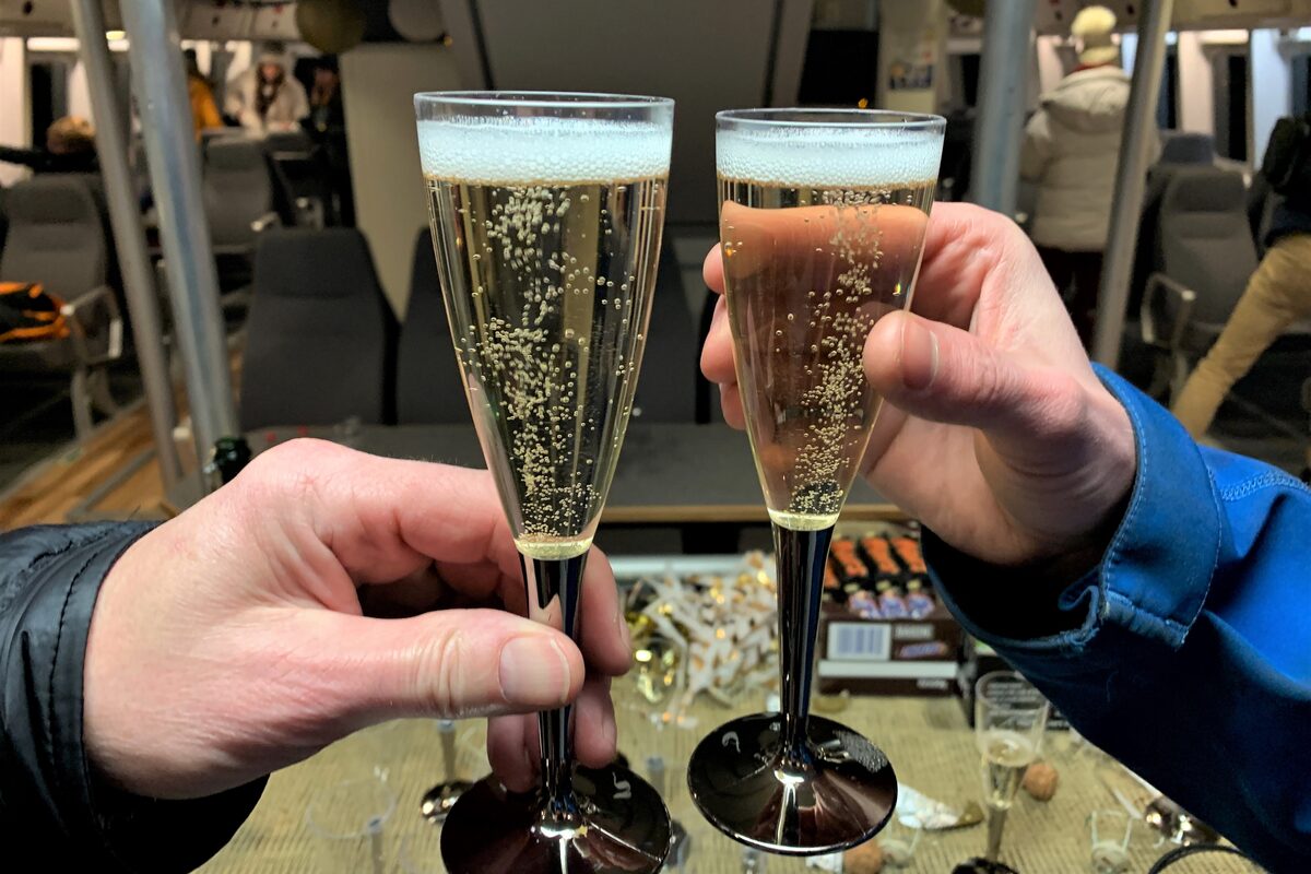 Drinking champagne from glasses