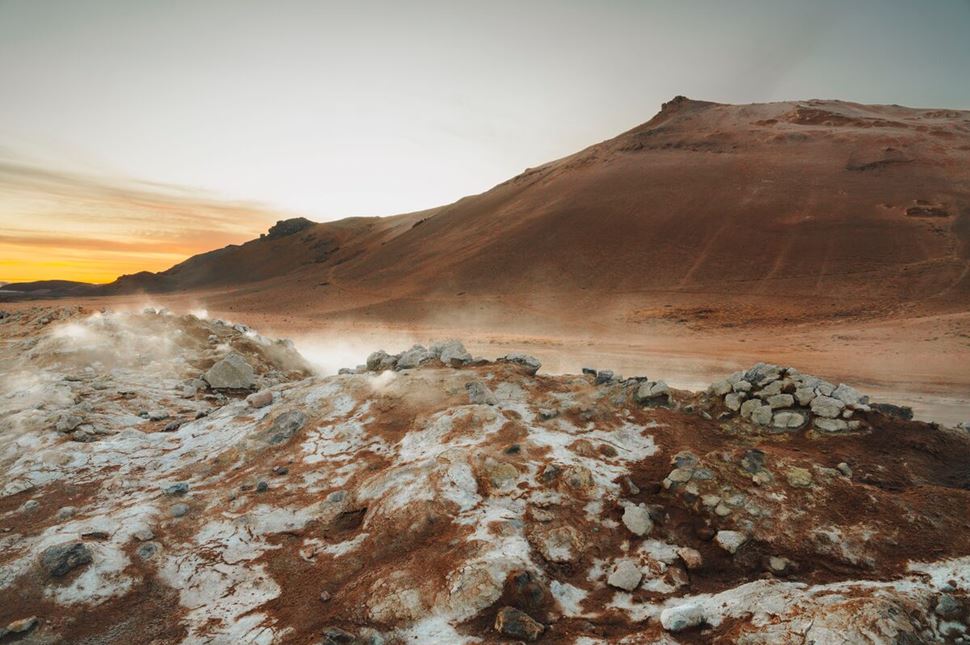 Myvatn Geothermal Landscape Sunset  Red rhyolite mountains in geothermal area Myvatn lake in Iceland