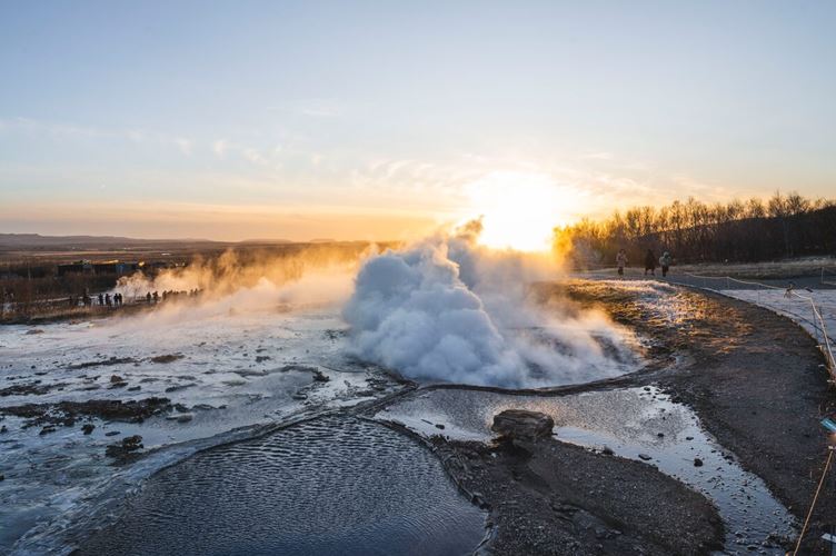 Steams over hot spring at sunset