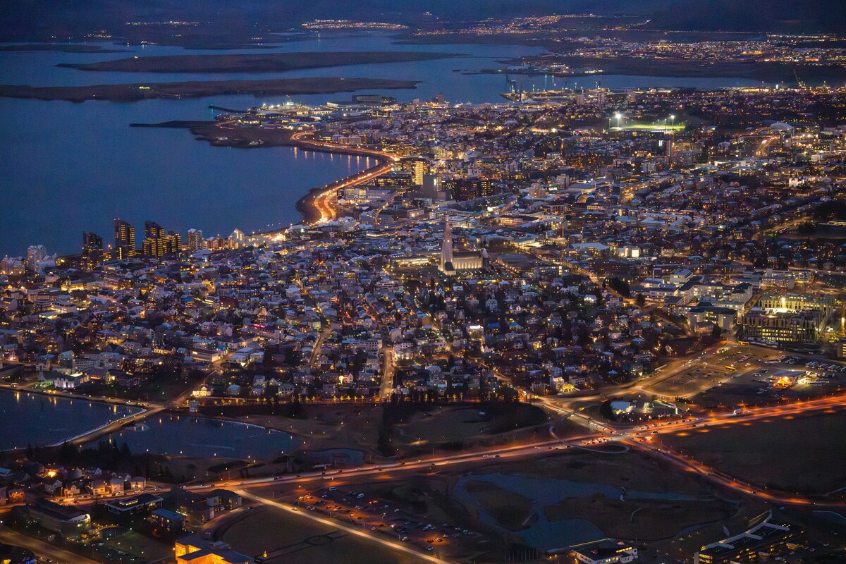 View from helicopter of reykjavik city lights at night time