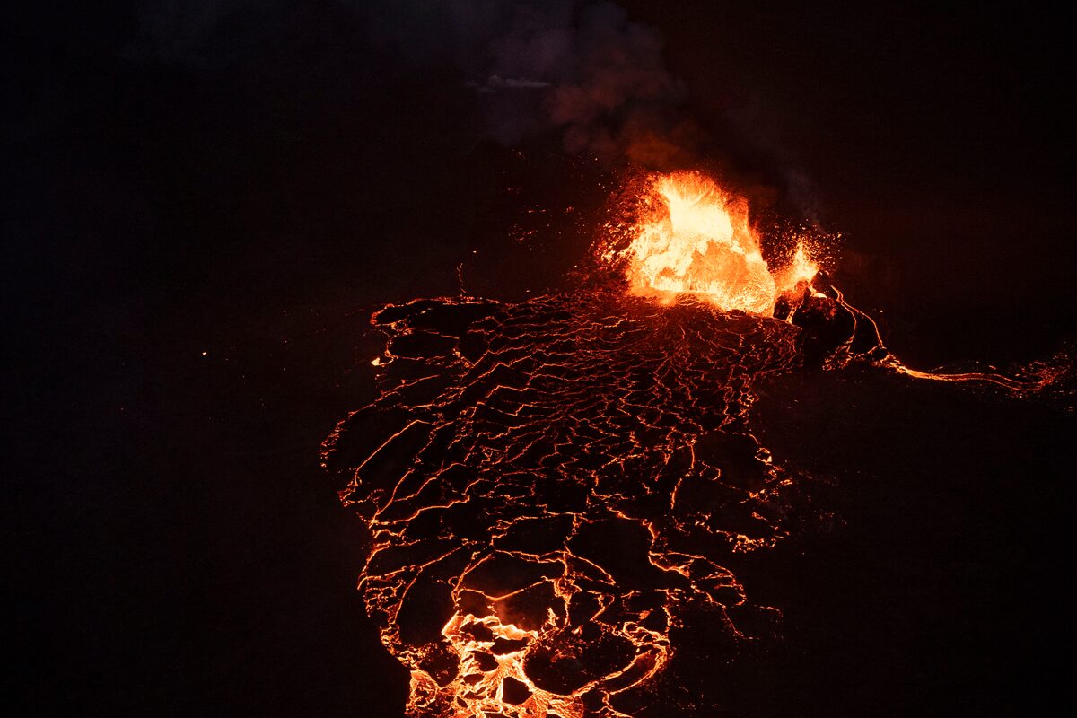 Night time pitch black view of active lava patterns at Nordurflug