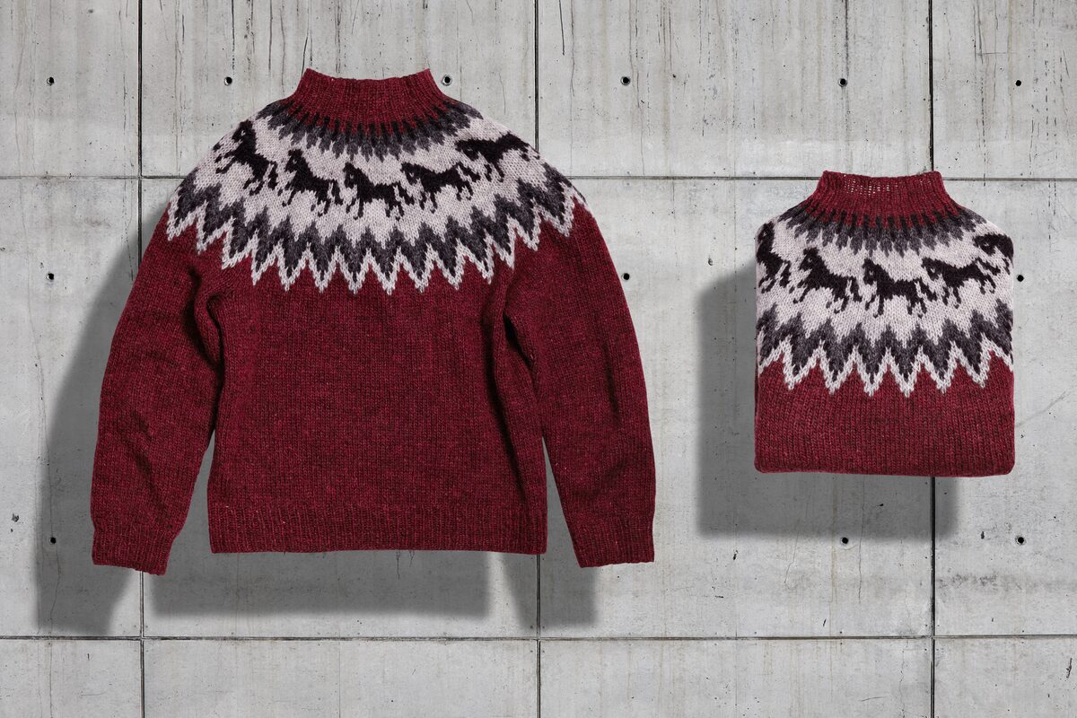 Traditional Icelandic sweaters in red color.