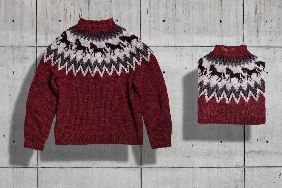 Traditional Icelandic sweaters in red color.