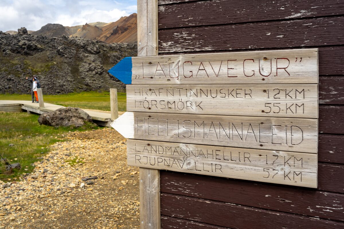 Signs showing directions in mountains