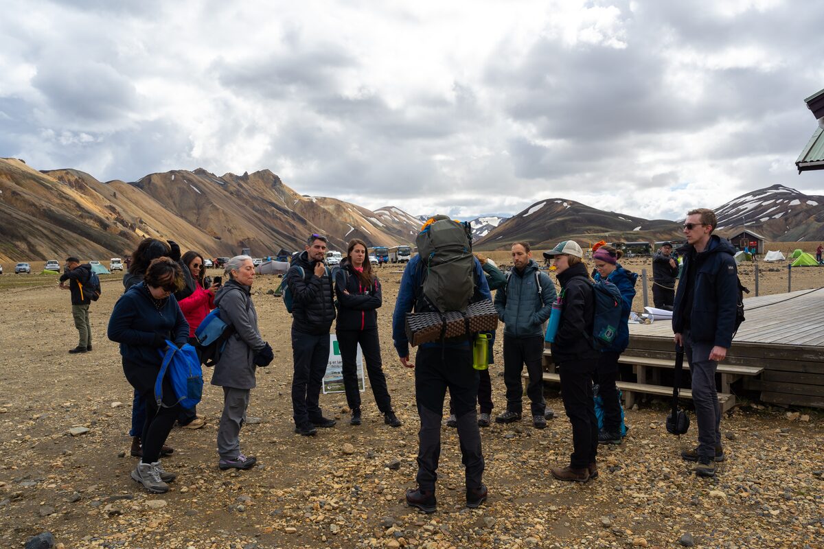 Group with guide preparing for trek in Iceland