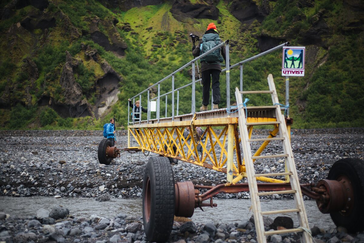 Couple of women walking through bridge