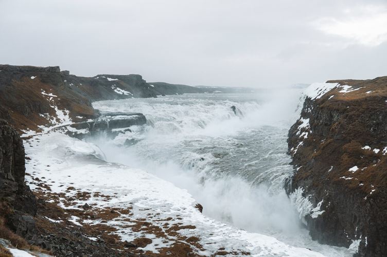 Gullfoss waterfall close up during winter in foggy weather