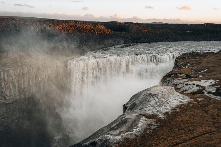 Close view of north Dettifoss waterfall during sun down