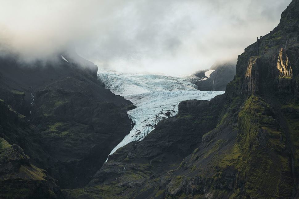 Ladscape view of Vatnajokull glacier in Iceland with overcast light grey skies.