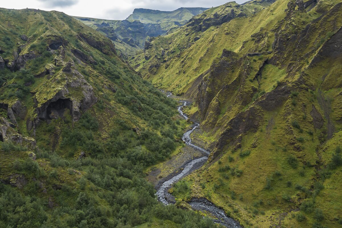 Jagged stream between moss covered mountains in Thorsmork, Iceland 
