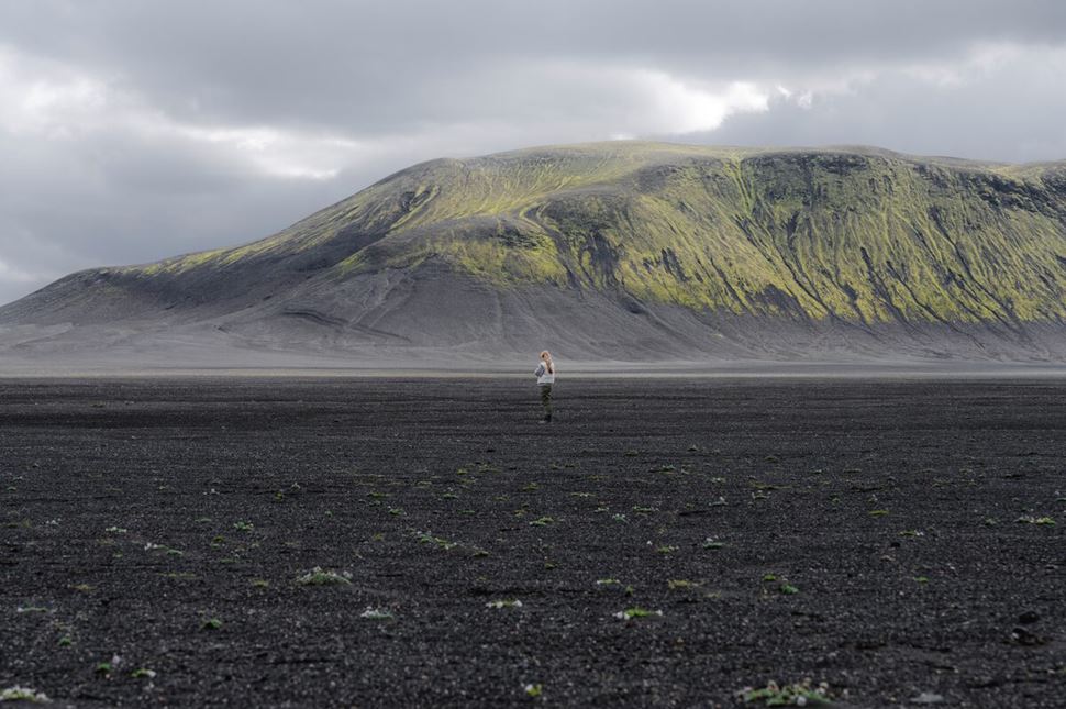 Female hikers standing on a road in Landmannalaugar