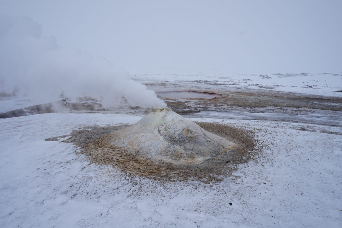 Hveravellir Oskurholl large fumarole covered in snow in winter