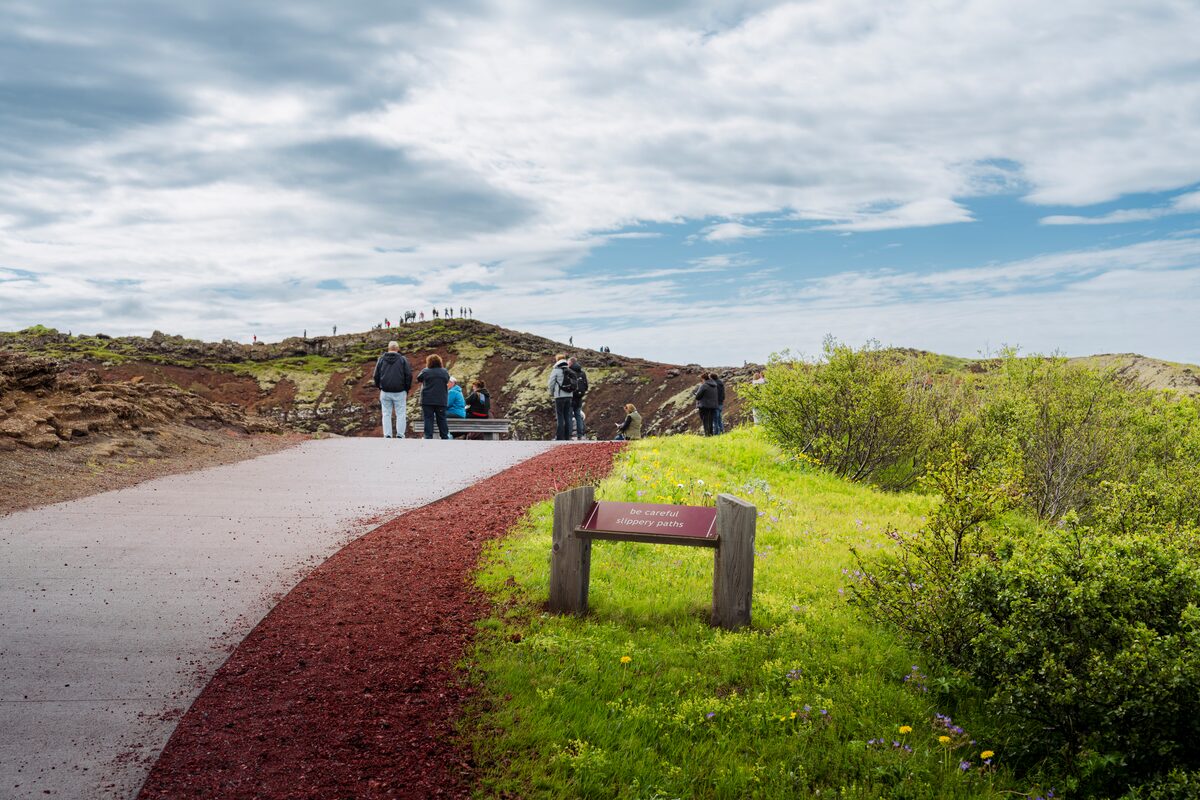Signage at entrance to view point at edge of the top of Kerid crater lake