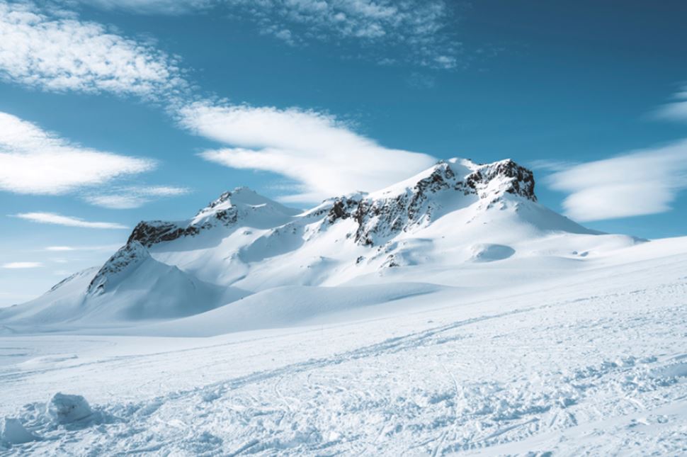 Picturesque landscape of Langjokull glacier in Iceland on sunny day with blue skies.