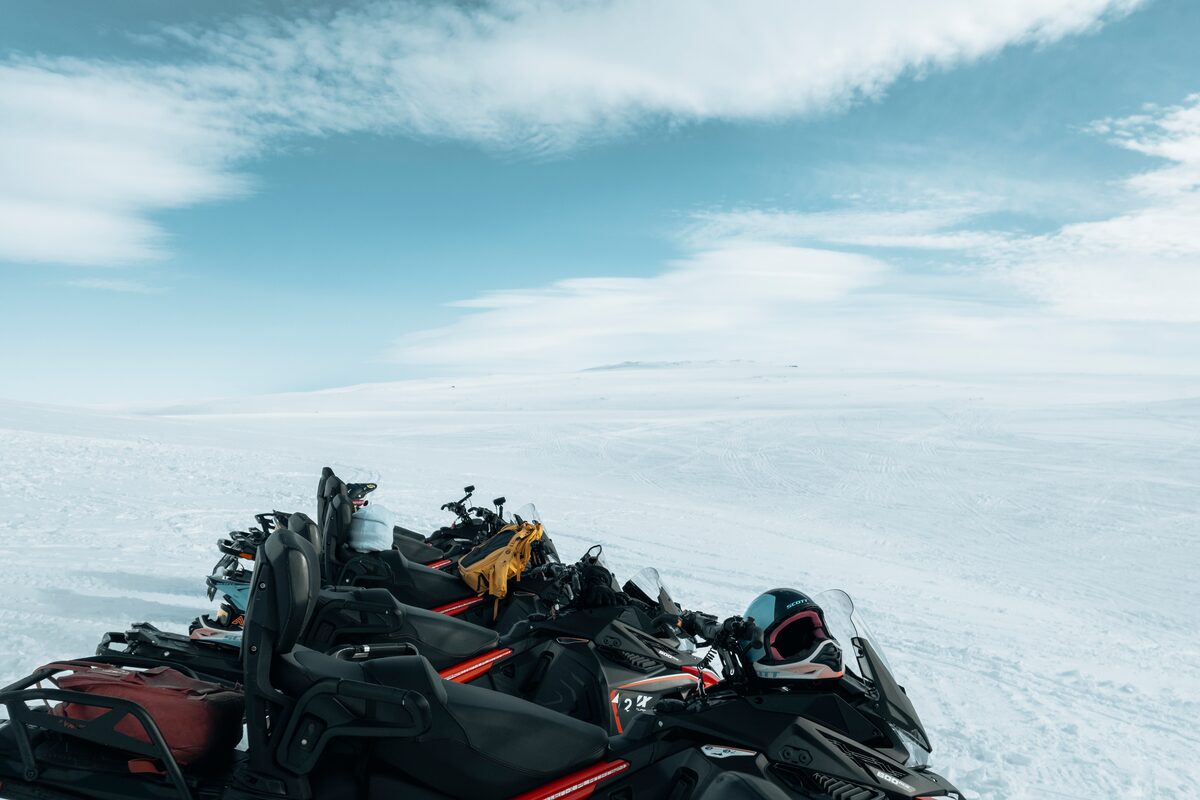 Snowmobiles parked at Langjokull glacier.