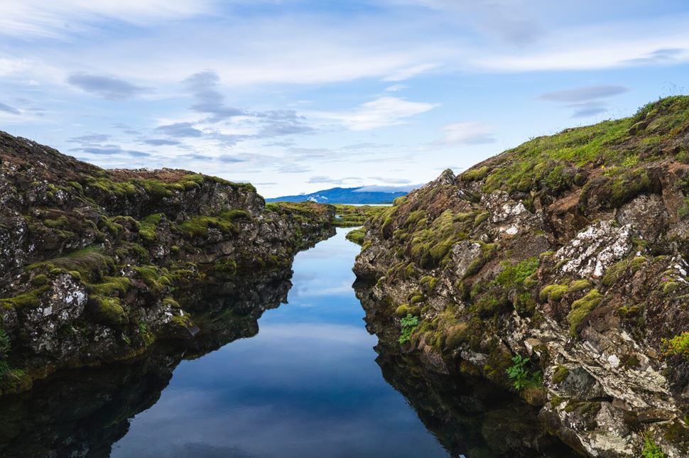 View from above water of Silfra water entrance between two tectonic plates at Thingvellir, Iceland.