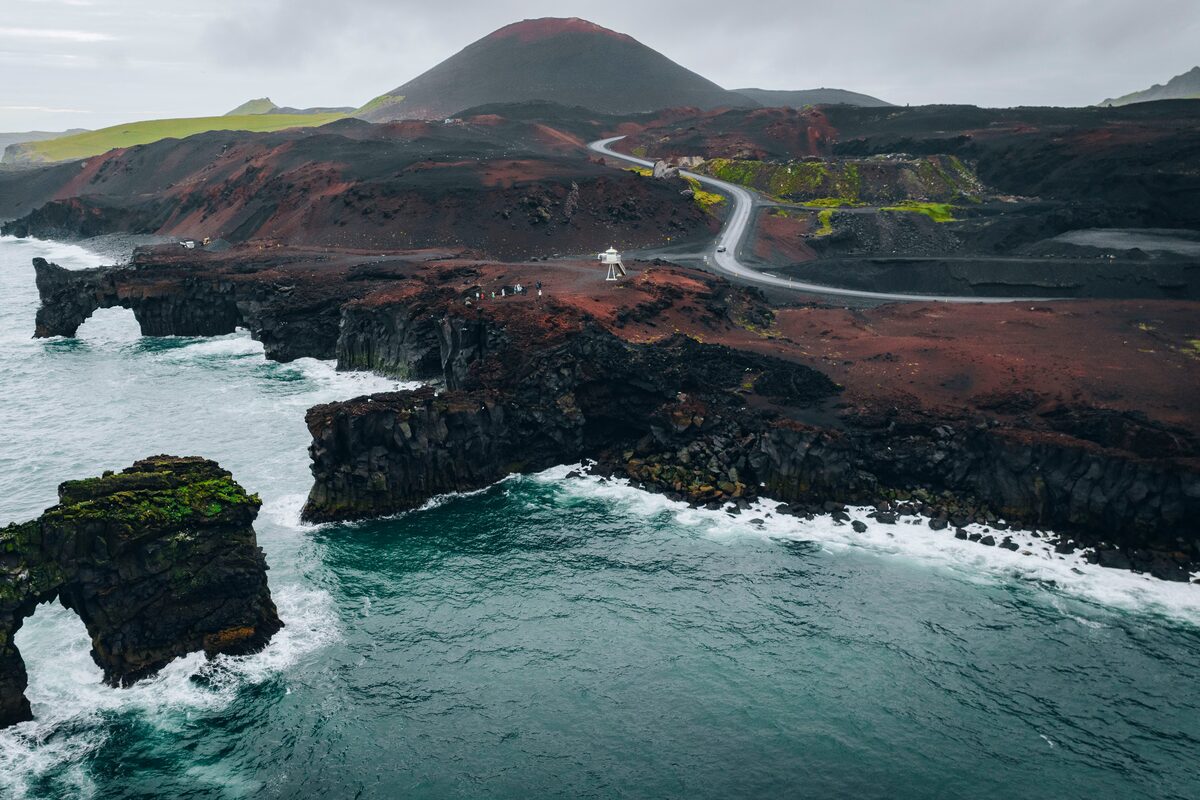 Red Eldfell volcano in Westmann Islands in Iceland durnig spring.