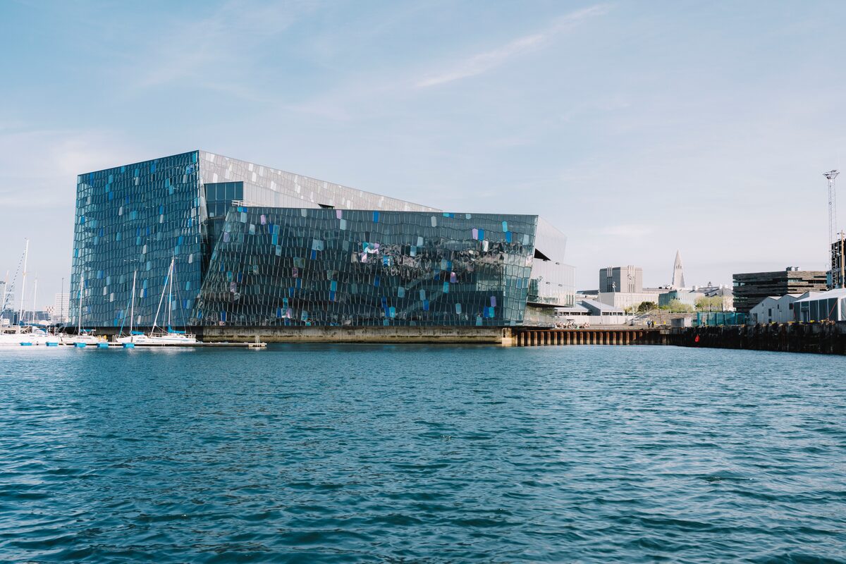 View of the Harpa concert hall in Reykjavik from the sea during summer.