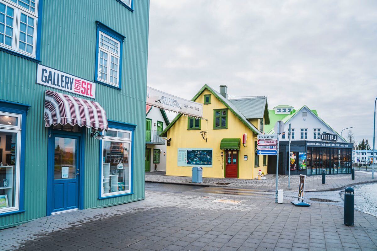 View of colorful gallery and food hall buildings in Selfoss town.