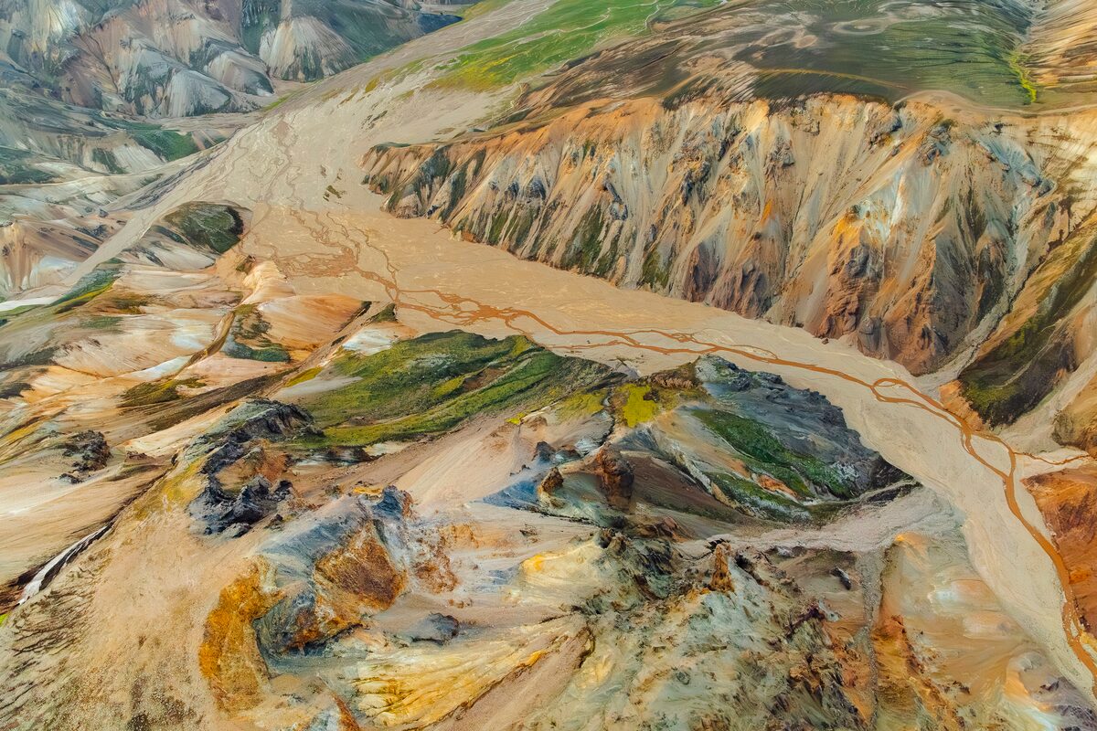 Aerial shot of Landmannalaugar Rhyolite mountain different colors across hiking landscape.
