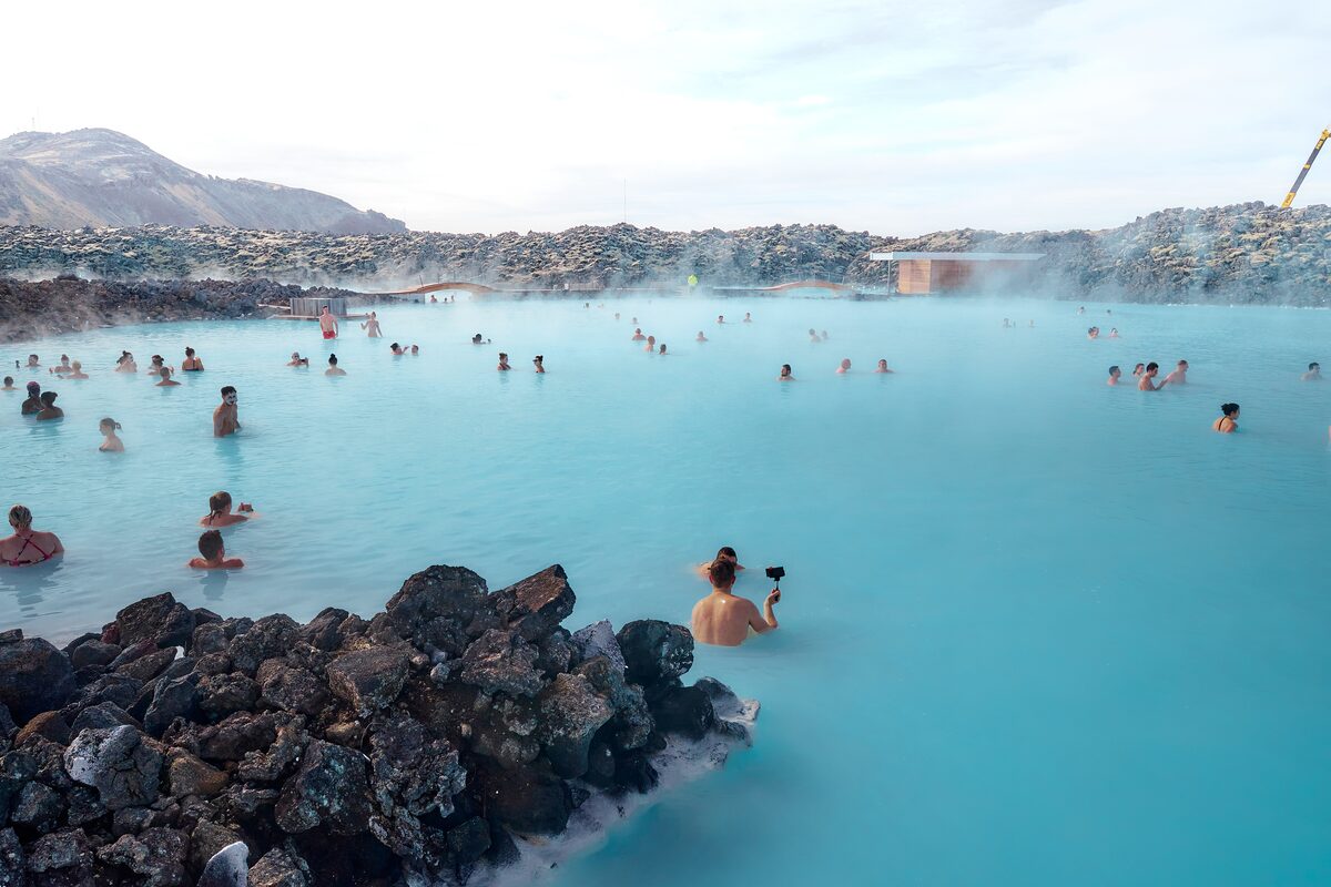 Tourists relaxing in the blue lagoon in Iceland.