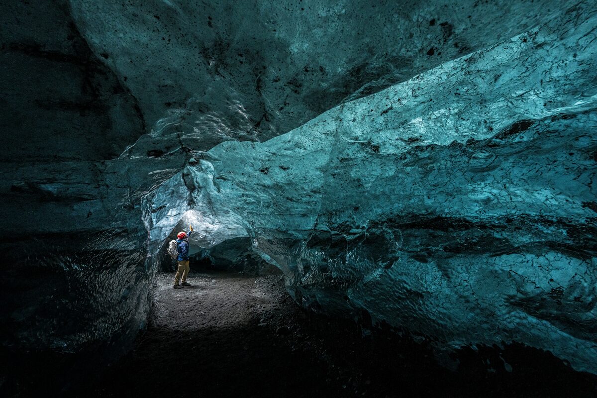 View from inside blue crystal ice cave in Iceland 2025.