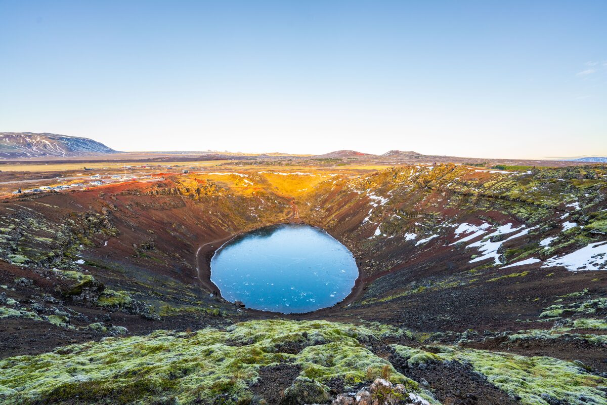 Landscape view of Kerid Volcanic crater during sunset from aerial view.