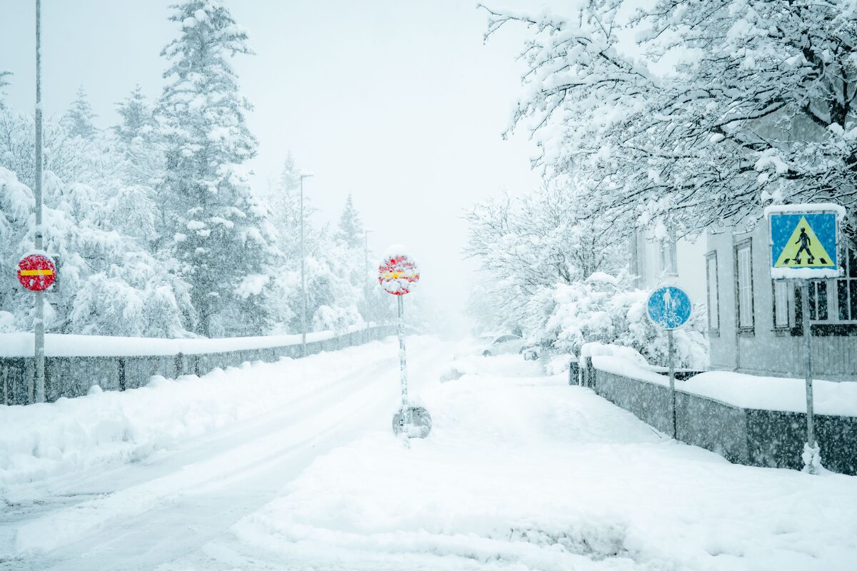 Stop Sign And Roads Covered In Snow In Reykjavik Iceland